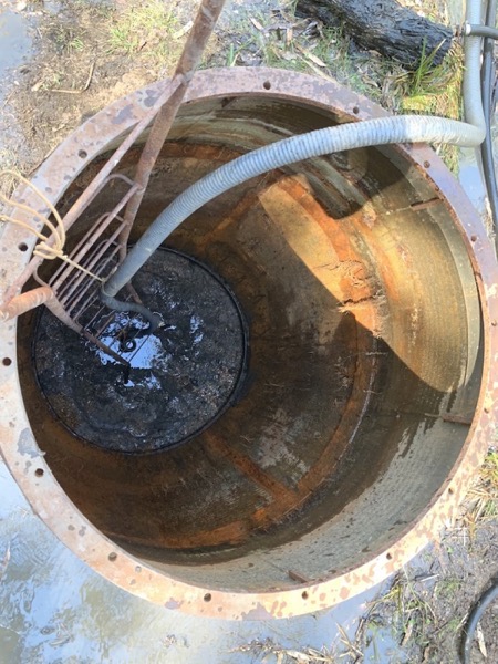 Looking down into a steel bore casing